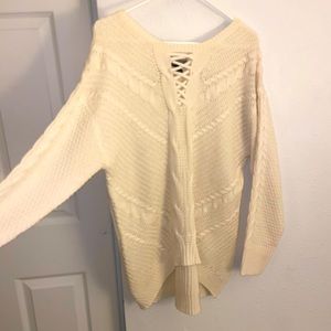 Allison Brittney cable knit sweater.